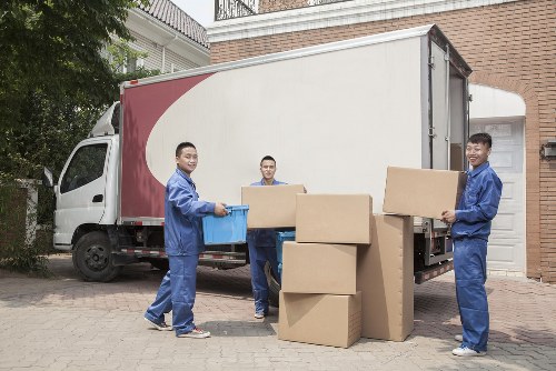 Removal team handling a same day move in a Tufnell Park street