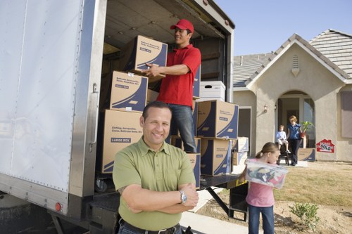 Packing and loading household items into a removal van in north London
